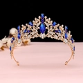 Macro detail of gold leaf tiara with sapphire blue marquise crystals and white rhinestones - KC Gold Royal Blue Crystal Crown