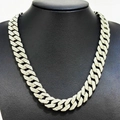 Detail of silver rhodium plated cuban link necklace with full diamond inlay on black bust - 20in/50cm / Silver