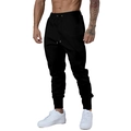 Dettaglio dei pantaloni sportivi neri da uomo con taglio aderente e polsini per allenamento - S / Nero