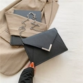 Chic black Saffiano leather envelope crossbody bag with silver V-clasp and chain strap - Black