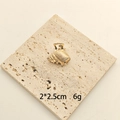 Golden starfish alloy hair claw clip, 2x2.5cm shell design for fringe styling - Spiral Shell