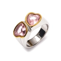 Detail of dual heart-shaped pink gemstones set in a minimalist gold and silver ring - Silver/Gold Edged (Pink Heart)