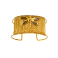 Detailed macro view of gold-plated dragonfly woven cuff bracelet with black wing details - Gold Dragonfly