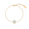 Gold stainless steel bracelet featuring a light blue square zircon with halo stones - Square Charm Bracelet / Gold (Light Blue Stone)
