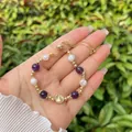 Detail of handmade 18k gold plated beaded bracelet with virgin mary medal and adjustable clasp - Virgin Mary Pendant / Purple Natural Stone / Purple