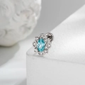 Silver cartilage piercing earring with an oval blue zircon and small clear stones - Sky Blue (Single)