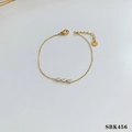 Golden stainless steel bracelet with three teardrop-shaped zircon stones and lobster clasp - Gold White Rhinestone Style (SBK456)