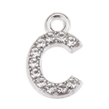 Macro detail of silver alloy letter C pendant with micro-pave white rhinestones - Letter C