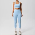 Detail of light blue high waist yoga leggings with functional side pockets and seam work - Sky Blue