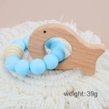 Baby teething bracelet with blue silicone beads and fish shaped beech wood teether - Fish/Blue Beads