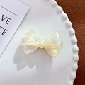 Pearlescent cream bow hair clip with golden metal base on elegant ceramic display - Duckbill Hair Clips / 5.4cm / Dazzle White-Duckbill Clip