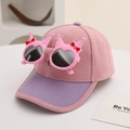 Close-up of pink and purple corduroy kids baseball cap with a crown sunglass decoration - Kids approx 3-10 years / Pink