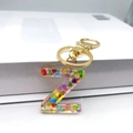 Detail of a transparent resin letter Z keychain with colorful heart-shaped sequins inside - Letter Z Lobster Clasp Keychain