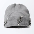 Close-up of light grey knit beanie with elegant crystal leaf jewelry embellishments - One Size / Gray
