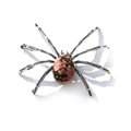 Detailed top view of a spider-shaped figurine with natural pink rhodonite stone body - Irregular Rhodonite