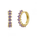 Detailed macro view of gold hoop earrings with claw-set round purple zircon stones - Gold with Purple Pave Huggie