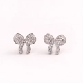 Elegant silver bow earrings with sparkling pink cubic zirconia in professional studio lighting - Style 1-Silver