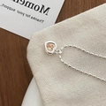 Silver ball chain bracelet with heart-shaped champagne stone pendant in a minimalist style - Orange Heart Necklace