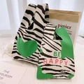 Knitted tote bag with black and white zebra stripes featuring a green heart and text - Ocean Green (Medium)