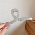 Light grey translucent cross claw clip in a minimalist twisted plastic design for women - 11CM Grey Shark Clip