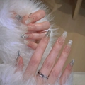 Elegant French press-on nails with silver glitter and rhinestone accents on white fur - Nude Pink Silver Star Glitter (N5222)