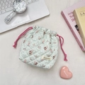Detail of mint green quilted cartoon drawstring bag with bear and rabbit patterns - Salt Style Bunny