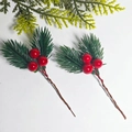 Close-up of artificial pine needles with red berries for DIY Christmas floral decor - Double Leaves 3 Red Berries