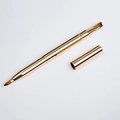 Detailed view of dual-ended golden retractable lip brush and concealer pen with metal caps - Double Ended Angled Brow Brush / Gold
