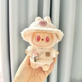 Plush doll in cream faux shearling hat and vest featuring pink heart Miuiu charm - Pink Diamond Hat + Yellow Polka Dot Shirt + Water Bottle / First And Second Generation Keychains Are Compatible With La Cloth Dolls. Dolls Not Included.