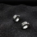 Silver stainless steel ear cuffs with Roman numeral engraving on black gravel background - Single Roman Numerals / Silver