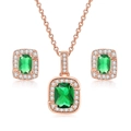 Detailed close-up of emerald green square zircon necklace and earrings jewelry set in rose gold - Rose Gold + Green Stone Set