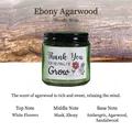 Αρωματικό κερί σε πράσινο γυαλί με μαύρο καπάκι και ετικέτα Thank You - Ξύλο Ουντ / Σκούρο Πράσινο