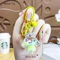 DIY Cinnamoroll themed liquid sand keychain with yellow bell and green beads - Yellow Cinnamoroll Milk Bean