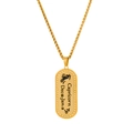 Macro detail of golden Capricorn zodiac pendant with engraved date and constellation sign - Capricorn