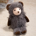 Simpatica capra di peluche grigio scuro con arti marroni su tappeto beige - Pecora Grigia / 30cm (0,25kg)