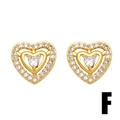 Sparkling gold-tone nested heart stud earrings with cubic zirconia pavé setting - Heart Earrings / Gold