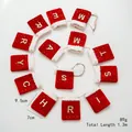 Christmas bunting with 14 red glitter pockets and golden Merry Christmas letters - Sequined Mini Stocking Pull Flag / Red