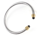 Silver twisted cable open cuff bracelet with gold accents and black end caps - Two-tone-Black Bead