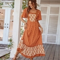 Elegantes orangefarbenes Maxikleid mit Blumenmuster und Rüschensaum für Damen - S / Orange