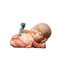 Cute pink monk figurine in reclining pose with green scepter for home desk decoration - 1222-2 Reclining Buddha (Medium)