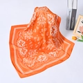 Elegant orange silk scarf with paisley patterns styled with books and tulips - Orange Paisley