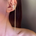 Detail of gold bow ear cuff with pavé zircon and hanging pearl chains on female model - Pearl Long Chain Tassel Ear Wrap (10993) / 1 Pair Pack / Gold