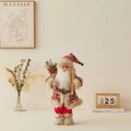 Decorative standing Santa Claus figurine with skis and sack for festive Christmas home decor - Holding Sled Style / 45cm High