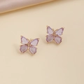Detailed macro view of small gold butterfly stud earrings with purple zircon wings - 17# Light Purple Stud Earrings