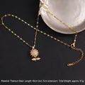 Gold sunflower spinning necklace in titanium steel with pave white zircon inlay - Pavé Sunflower Rotating Style (A841)