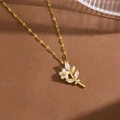Elegant gold necklace with flower pendant featuring pearls and marquise zircon accents - Floral Pearl Style (T0663) / Gold