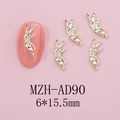 Detail of gold metal angel nail art charm size 6x15.5mm on pink manicure nails - Gold Abstract Angel (AD90)