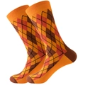 Detail of argyle knit mid-calf socks featuring orange and brown diamond patterns - Orange Brown Argyle