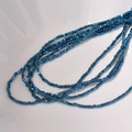 Macro shot of 2mm blue metallic hematite cube beads for DIY bracelet and necklace jewelry making - Blue