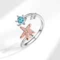 Adjustable silver ring featuring a blue sea turtle and rose gold starfish with crystals - Adjustable Open / Silver & Rose Gold & Blue